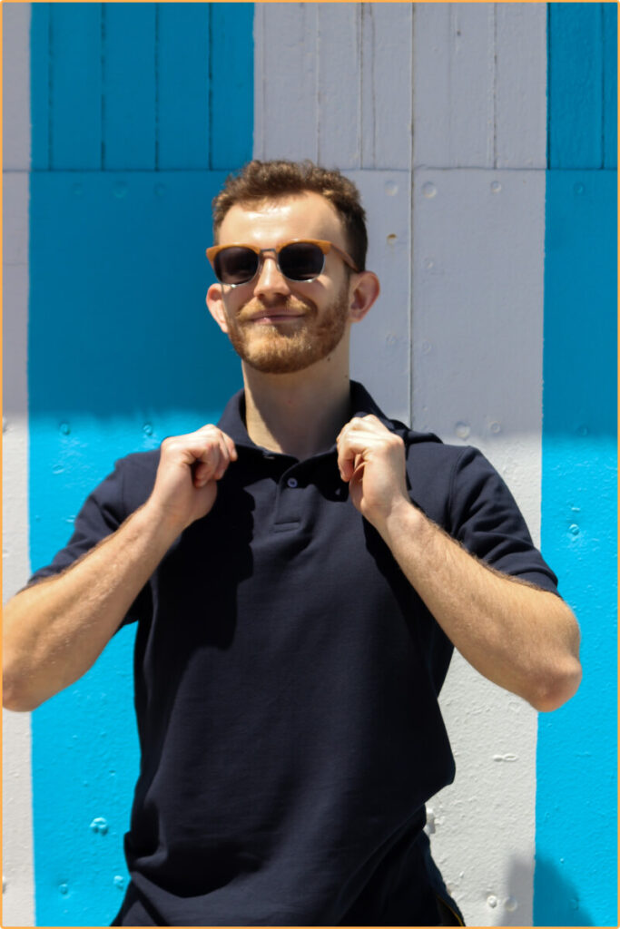 Man with blue Polo shirt adjusting Changing Attire clothing